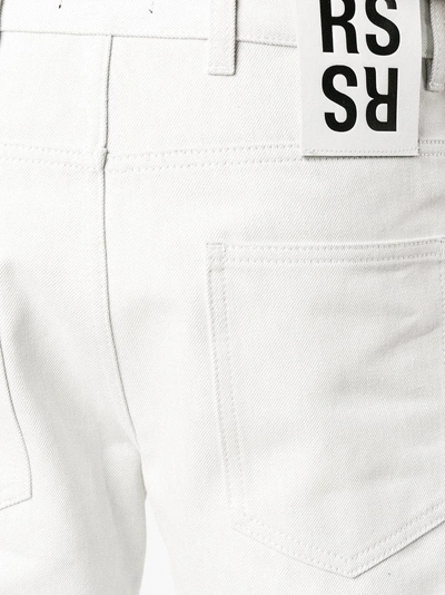 Shop Raf Simons Straight Bleached Jeans In White