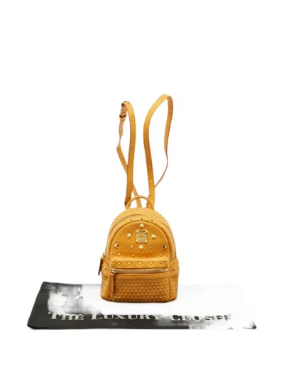 Pre-owned Mcm Stark Studded Backpack In Yellow