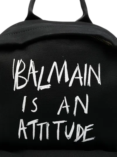 Balmain Slogan-print Backpack In Black
