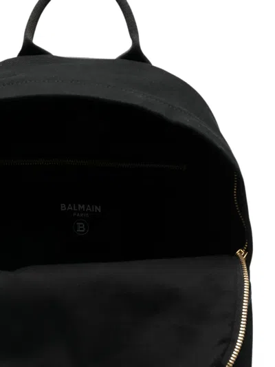 Balmain Slogan-print Backpack In Black