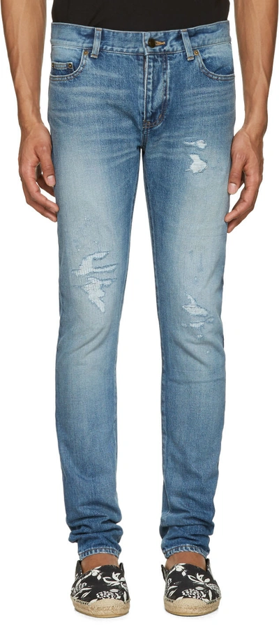 Saint Laurent Men's Destroyed Patch Skinny Jeans In Blue