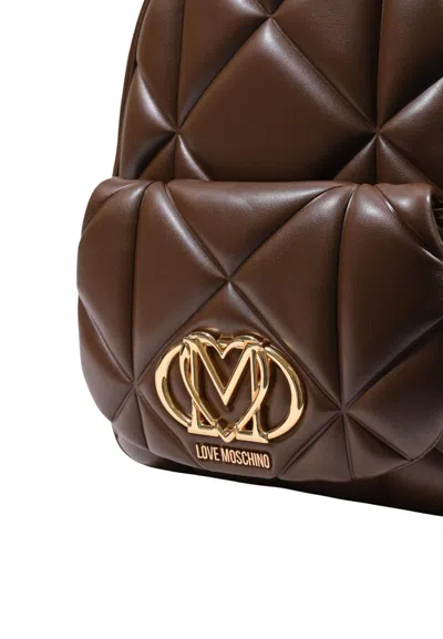 Moschino Quilted Backpack In Brown