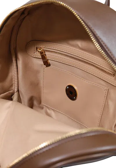 Moschino Quilted Backpack In Brown
