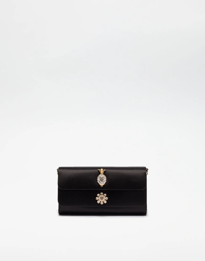 Shop Dolce & Gabbana Dorine Satin Clutch With Jewel Applications In Black