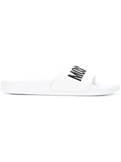 Moschino Embossed Logo Pool Slides In White
