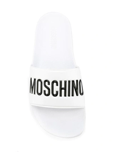 Moschino Embossed Logo Pool Slides In White