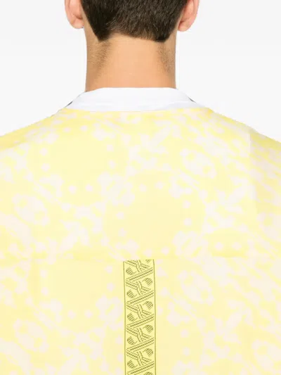 Puma All-over-pattern Zip-up Jacket In Yellow