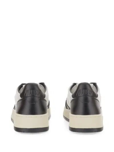 Autry Medalist Low Sneakers In Calf Leather With Perforated Toe In Black