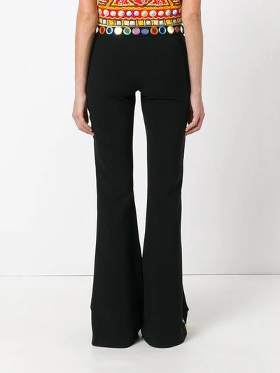 Shop Moschino Mirror Embroidered Flared Trousers