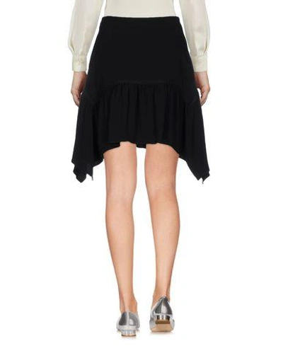 Shop Roberto Cavalli Mini Skirt In Black