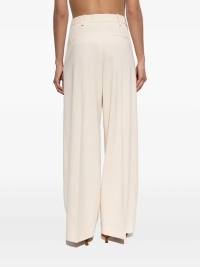 By Malene Birger 탈리아 플리츠 와이드 팬츠 In Neutral