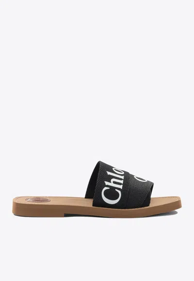 Chloé Woody Flat Logo Ribbon Slide Sandals In Black