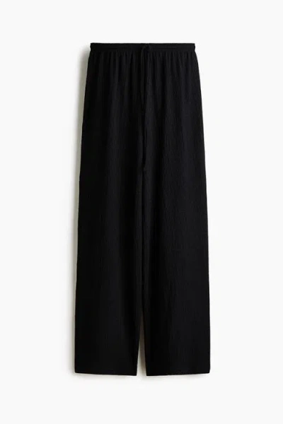 H&m Textured Drawstring Trousers In Black