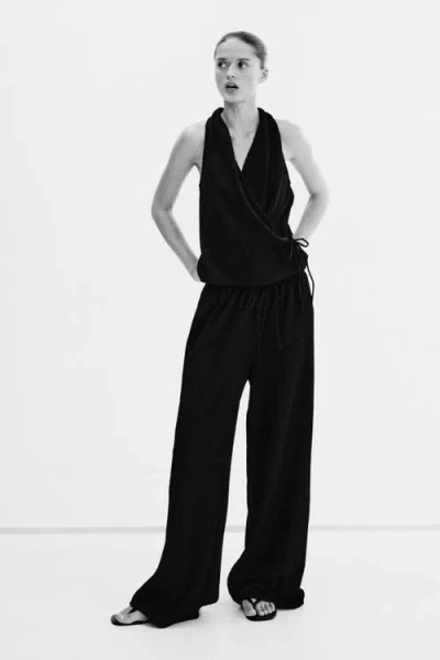 H&m Textured Drawstring Trousers In Black