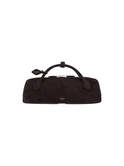 Alaïa Le Teckel Suede Leather Clutch In Brown