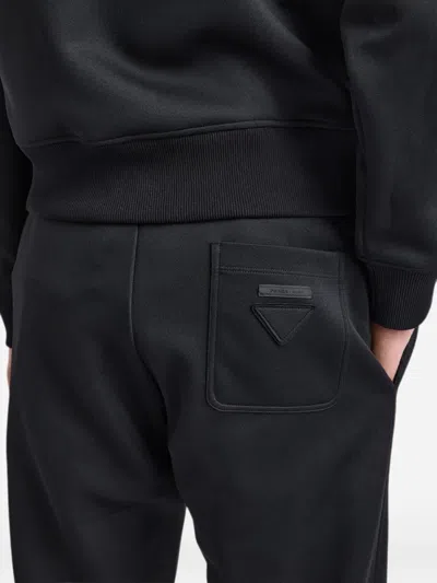 Prada Technical Jersey Pants In Black