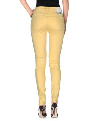 Shop Love Moschino Jeans In Yellow