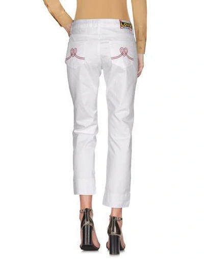 Shop Love Moschino Casual Pants In White