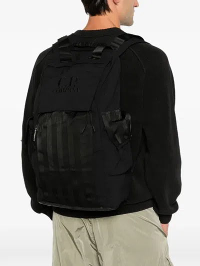 C.p. Company Logo-embroidered Multi-pocket Backpack In Black