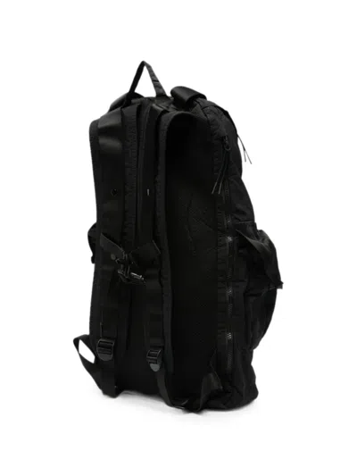 C.p. Company Logo-embroidered Multi-pocket Backpack In Black