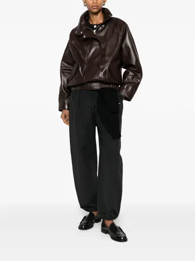 Sandro Oversized Leather Jacket In Black
