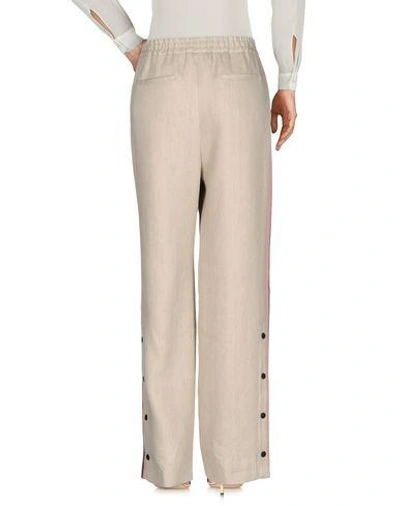 Shop Msgm Casual Pants In Sand