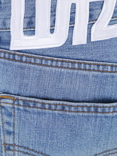 Lutz Huelle Asymmetric-hem Regular-fit Jeans In Multi