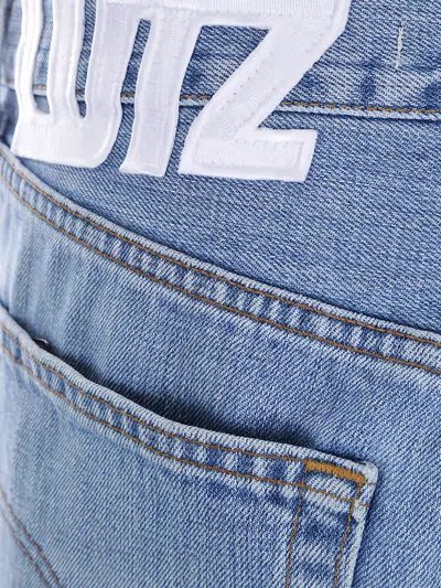 Lutz Huelle Asymmetric-hem Regular-fit Jeans In Multi