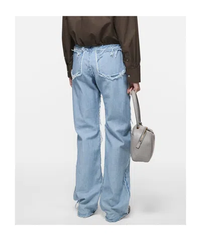 Acne Studios Multi-pocket Jeans In Blue