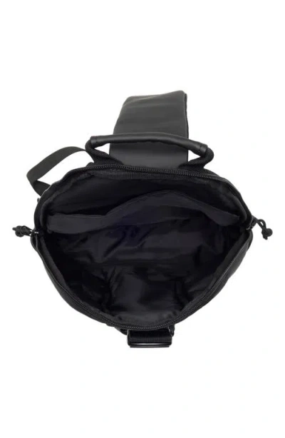 Duchamp Rubberized Sling Bag In Black