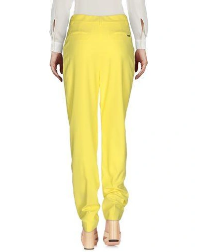 Shop Blumarine Casual Pants In Yellow