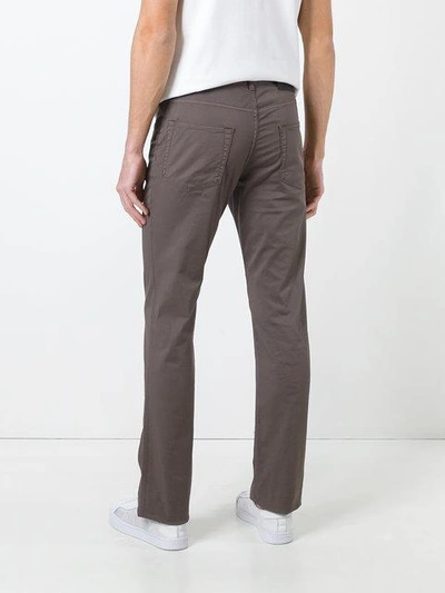 Shop Brioni Tapered Trousers In Brown