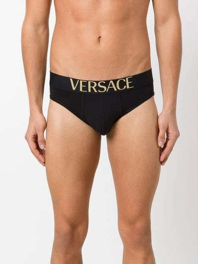 Shop Versace Pack Of Three Logo Waistband Briefs