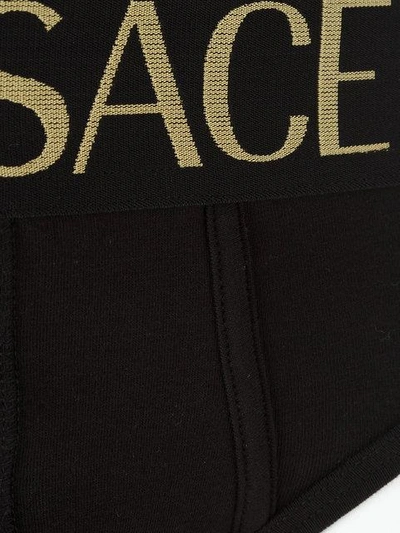 Shop Versace Pack Of Three Logo Waistband Briefs