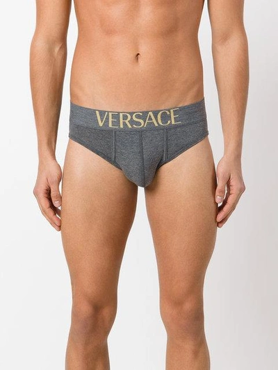 Shop Versace Pack Of Three Logo Waistband Briefs