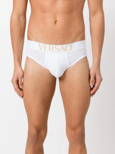 Shop Versace Pack Of Three Logo Waistband Briefs