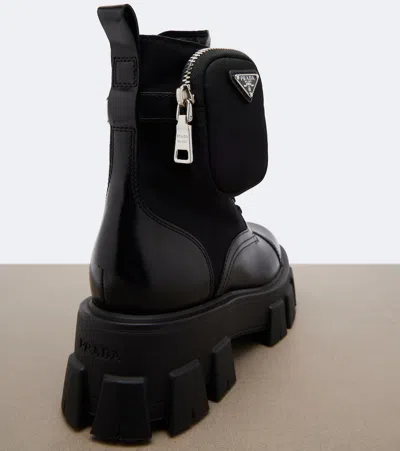 Prada Monolith Leather Ankle Boots In Black