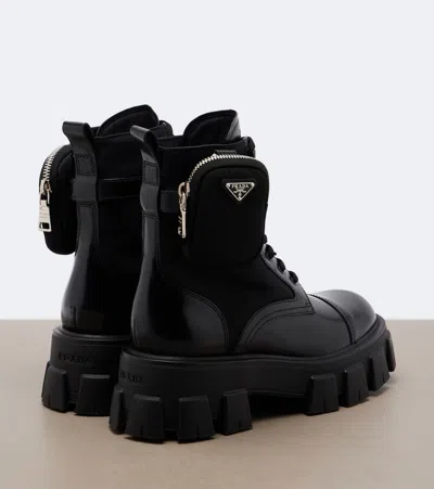 Prada Monolith Leather Ankle Boots In Black