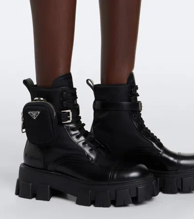 Prada Monolith Leather Ankle Boots In Black