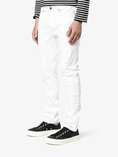 Shop Saint Laurent White Original Distressed Jeans