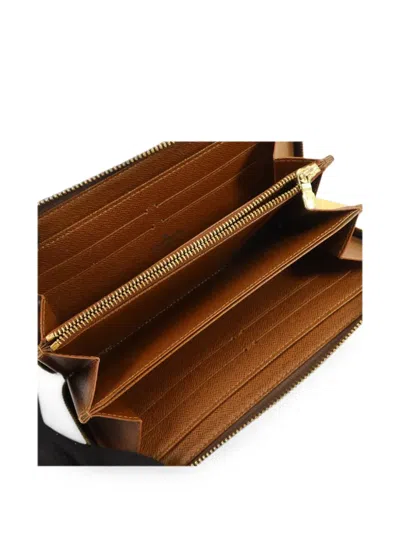 Pre-owned Louis Vuitton Monogram Zippy Wallet In Brown