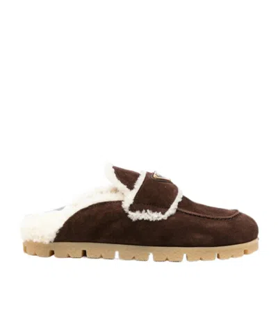 Prada Shearling-trim Logo-plaque Suede Mules In Brown
