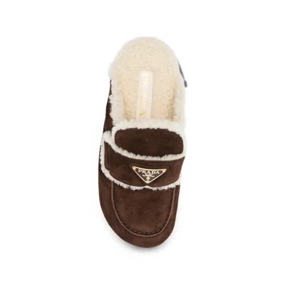 Prada Shearling-trim Logo-plaque Suede Mules In Brown