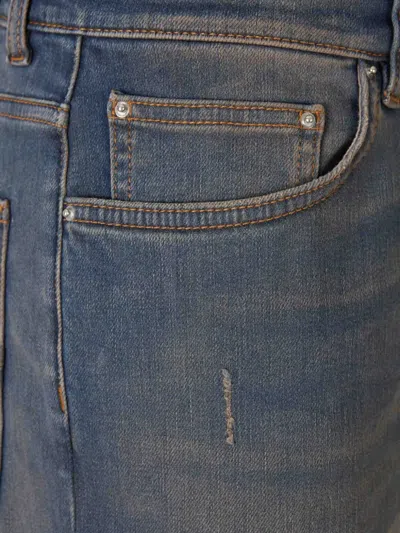 Amiri Distressed Ribbed-panel Jeans In Blue