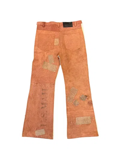 PATCHWORK FLARED JEANS