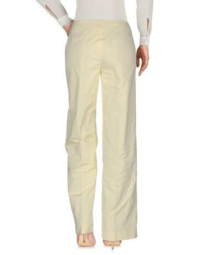 Shop Jil Sander Casual Pants In Light Yellow