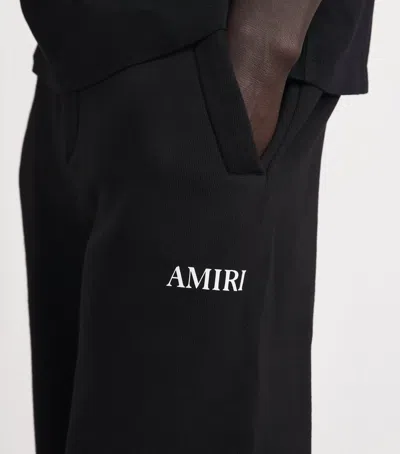 Amiri Cotton Relaxed Logo Sweatpants In Black