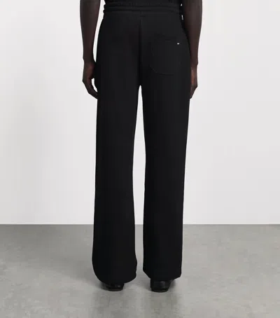 Amiri Cotton Relaxed Logo Sweatpants In Black
