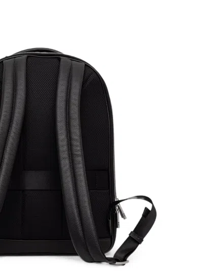Trussardi Logo-print Pebbled Backpack In Black