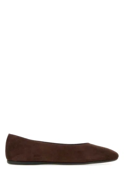 Prada Flat Sole Pointed Toe Leather Loafers In Brown